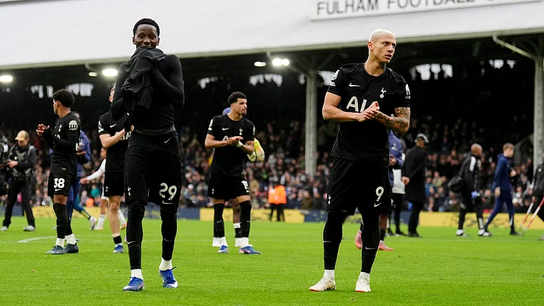 Tottenham Hotspur's Pape Matar Sarr, left, and Richarlison on the pitch after their English Premier League soccer match against Fulham in London, Sunday, March 1, 2026. - | Photo: PA/John Walton via AP