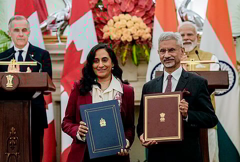 Prime Minister Narendra Modi and Canadian Prime Minister Mark Carney witness an MoU exchange between External Affairs Minister S Jaishankar and Canada Foreign Affairs Minister Anita Anand during a joint press meet, at Hyderabad House in New Delhi.