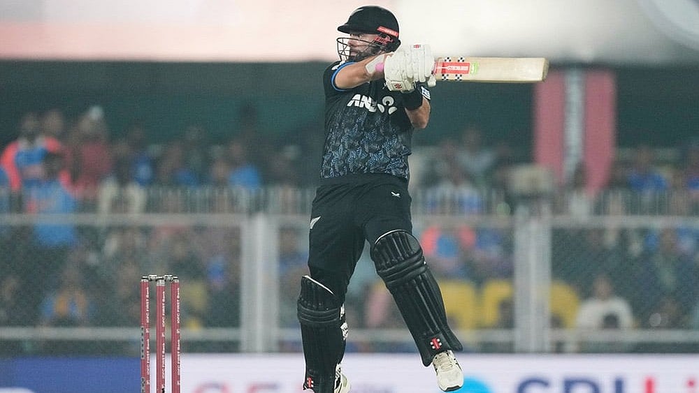 New Zealand's Daryl Mitchell plays a shot during the third T20 cricket match between India and New Zealand in Guwahati, India. - Photo: AP/Anupam Nath