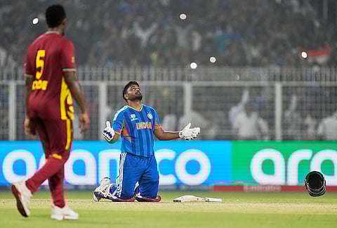 India's Sanju Samson looks to the heavens after India won the T20 World Cup cricket match against West Indies in Kolkata.