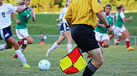 Offside Rule Change Explained: What Is Arsene Wenger’s Controversial New Law Cleared For Trial | Photo: Pexels/Noelle Otto : Representative photo of a football linesman with the offside flag.