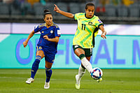 Australia 1-0 Philippines, AFC Women’s Asian Cup 2026: Sam Kerr’s Sole Strike Helps Matildas Clinch Victory- In Pics | Photo: AP/Gary Day : Australia's Mary Fowler kicks the ball clear of Philippines' Jaclyn Sawicki, left, during the Women's Asia Cup soccer match between Australia and the Philippines in Perth, Australia.