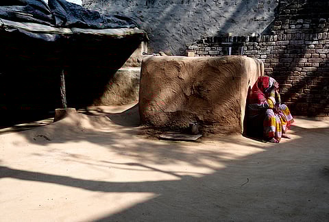 Mother waits for a daughter whob is gone forever at bool garhi village at Hathras.
​