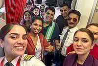 Day In Pics: March 03, 2026 | Photo: @AirIndia_News/X via PTI : Passengers and crew of Air India flight AI916D from Dubai arrive at the Indira Gandhi International Airport, in New Delhi. The airline said the flight was the first by an Indian carrier to land in the national capital amid the ongoing conflict in the Middle East.