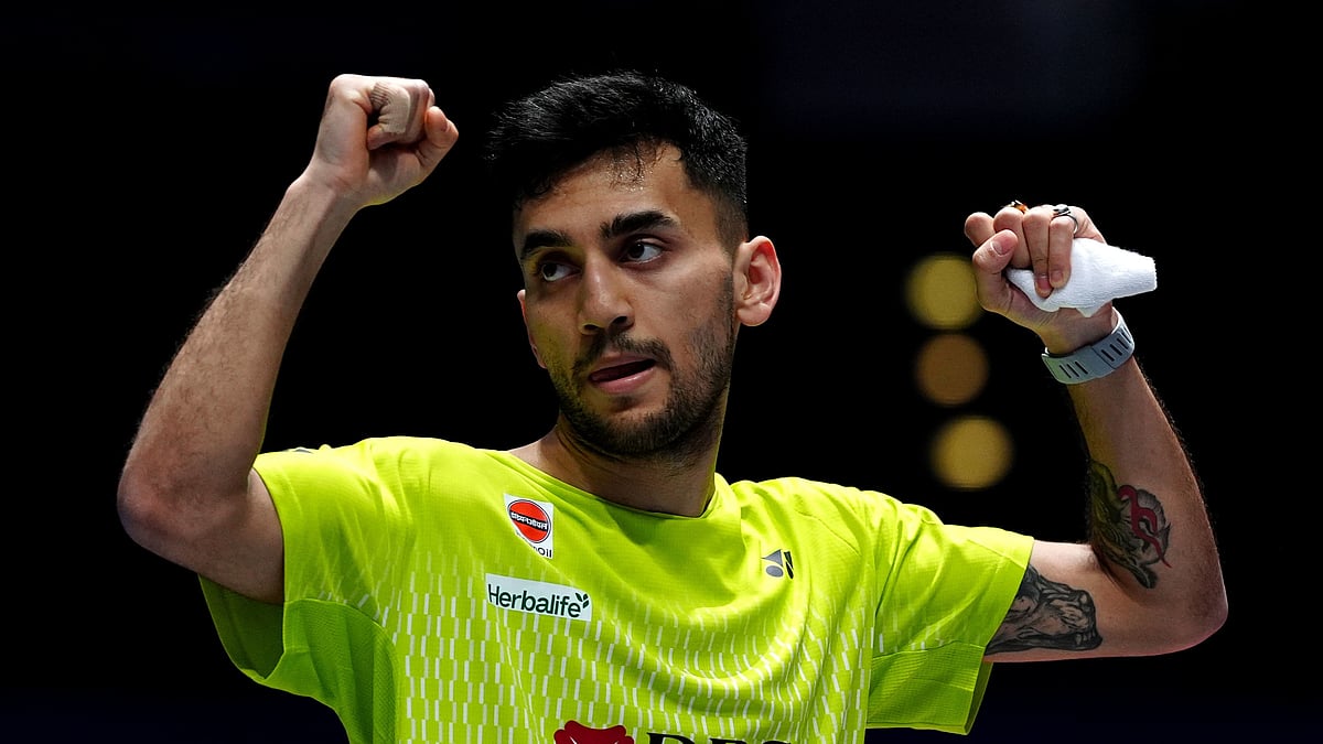 India's Lakshya Sen celebrates winning his men's singles match against China's Shi Yuqi on day one of the All England Open Badminton Championships in Birmingham, England, Tuesday, March 3, 2026. -  (Bradley Collyer/PA via AP)