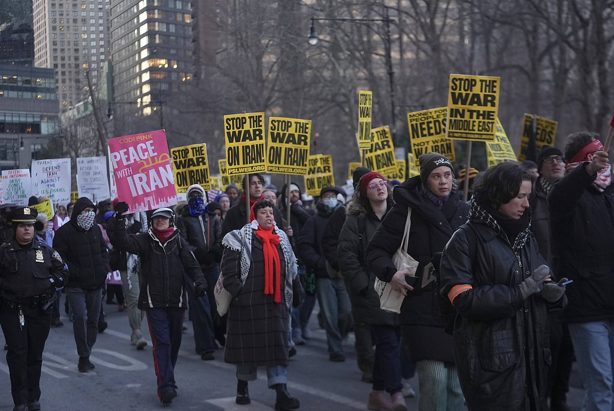 Protestors take out march against Trump over Israeli strikes on Iran