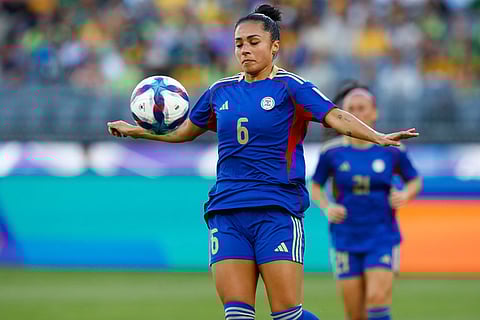 Philippines' Jaclyn Sawicki attempts to control the ball during the Women's Asia Cup soccer match between Australia and the Philippines in Perth, Australia.