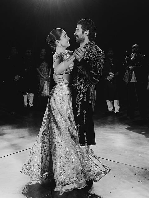 Rashmika wore a silver-coloured shimmery lehenga, while Vijay donned a bling jacket with jewel-studded black outfit.