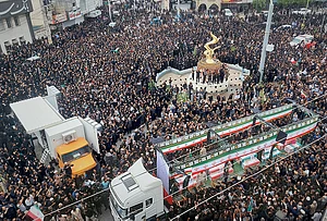 | Photo: Abbas Zakeri/Mehr News Agency via AP : Residents and officials attend the funeral of people killed in what Iranian officials said was an Israeli-U.S. strike Feb. 28 on a girls' elementary school in Minab, Iran.