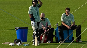 | Photo: AP/Bikas Das : New Zealand's captain Mitchel Santner, right, Daryl Mitchell, centre and Rachin Ravindra take a break during the practice session ahead of their T20 World Cup cricket match against South Africa, in Kolkata, India, Tuesday, March 3, 2026.