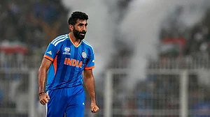 | Photo: AP/Bikas Das : India's Jasprit Bumrah celebrates the wicket of West Indies' Roston Chase during the T20 World Cup cricket match between India and West Indies in Kolkata.