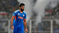 | Photo: AP/Bikas Das : India's Jasprit Bumrah celebrates the wicket of West Indies' Roston Chase during the T20 World Cup cricket match between India and West Indies in Kolkata.