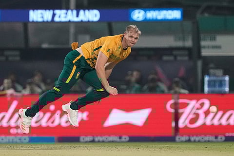 South Africa's Corbin Bosch bowls a delivery during the first T20 World Cup cricket semifinal match between New Zealand and South Africa in Kolkata.