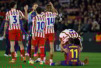 FC Barcelona Vs Atletico Madrid, Copa Del Rey 2025-26: Barca's Fightback Falls Short In Semi-final 2nd Leg | Photo: AP/Joan Monfort : Atletico Madrid's Johnny Cardoso hugs Barcelona's Raphinha after during the Copa del Rey semifinal second leg soccer match between Barcelona and Atletico Madrid in Barcelona, Spain.