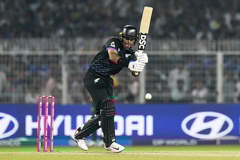 New Zealand's Rachin Ravindra plays a shot during the first T20 World Cup cricket semifinal match between New Zealand and South Africa in Kolkata.