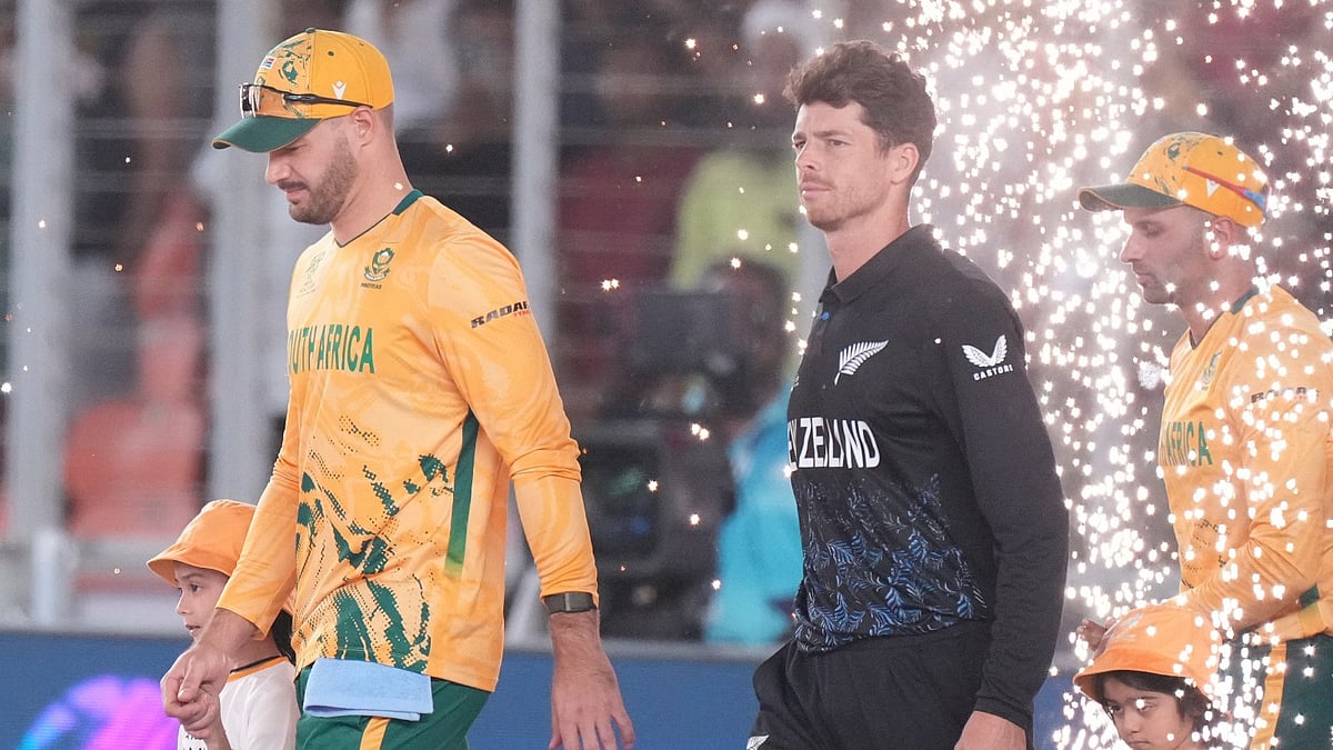South Africa's captain Aiden Markram along with New Zealand's captain Mitchel Santner arrives with their team for the anthem before the start of the ICC T20 World Cup 2026 cricket match between South Africa and New Zealand in Ahmedabad. - AP Photo