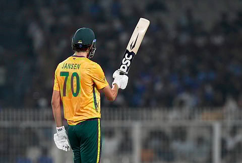 South Africa's Marco Jansen celebrates his fifty runs during the first T20 World Cup cricket semifinal match between New Zealand and South Africa in Kolkata.