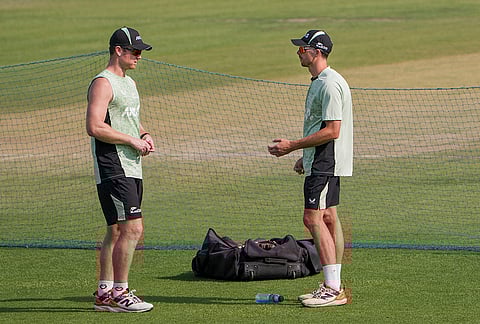 New Zealand's captain Mitchell Santner, right, with teammate during a training session ahead of the ICC Men's T20 World Cup 2026 first semifinal cricket match between New Zealand and South Africa, at Eden Gardens, in Kolkata.