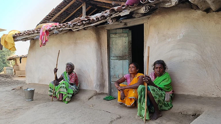 Peiro Devi (middle) and other women who were forced to put their hands into boiling water to prove they were not witches - File Photo