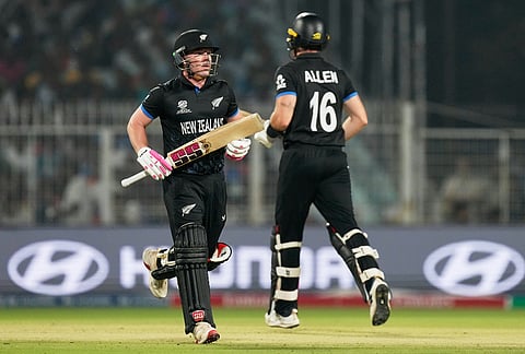 New Zealand's Tim Seifert, left, and batting partner Finn Allen run between the wickets during the first T20 World Cup cricket semifinal match between New Zealand and South Africa in Kolkata.