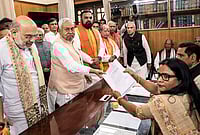 Sushasan Babu Nitish Kumar To Step Down: 10-Time Bihar CM Files Nomination For Rajya Sabha | Photo: Handout via PTI : Bihar Chief Minister Nitish Kumar in the presence of Union Home Minister Amit Shah files nomination papers for the Rajya Sabha polls, in Patna. State Deputy Chief Ministers Samrat Choudhary and Vijay Kumar Sinha also seen.