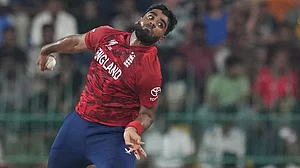 | Photo: AP/Eranga Jayawardena : England's Rehan Ahmed bowls a delivery during the T20 World Cup cricket match between England and New Zealand in Colombo, Sri Lanka.