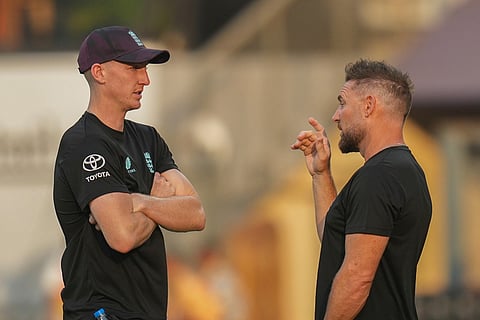 England coach Brendon McCullum, right, chats with England's captain Harry Brook during a training session ahead of their T20 World Cup cricket semi final match against India in Mumbai.
