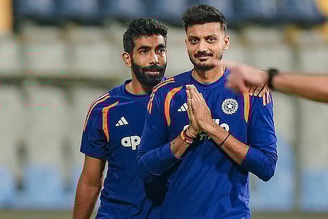 India's Jasprit Bumrah, left, and Axar Patel during a training session ahead of the ICC Men's T20 World Cup 2026 semi-final cricket match between India and England, in Mumbai.