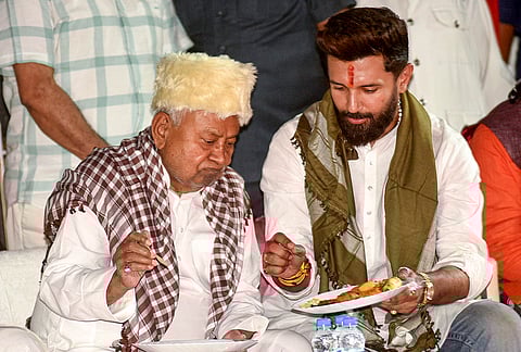 Nitish Kumar along with Union Minister Chirag Paswan at an 'Iftar' during the holy month of Ramzan, in Patna, in this March 24, 2025 file image. 