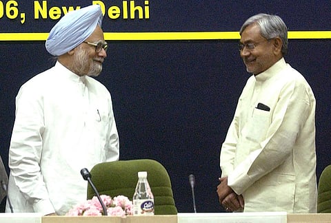Prime Minister Manmohan Singh with Bihar Chief Minister Nitish Kumar during a meeting of the standing committee of the Chief Ministers of Naxal Affected States, in New Delhi, in this April 13, 2006, file image. 