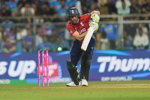 England's Jos Buttler plays a shot during the T20 World Cup cricket semi-final match between India and England in Mumbai, India.