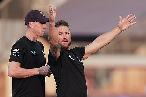 England's head coach Brendon McCullum, right, and captain Harry Brook during a training session ahead of the ICC Men's T20 World Cup 2026 second semifinal cricket match between India and England at Wankhede Stadium, in Mumbai.