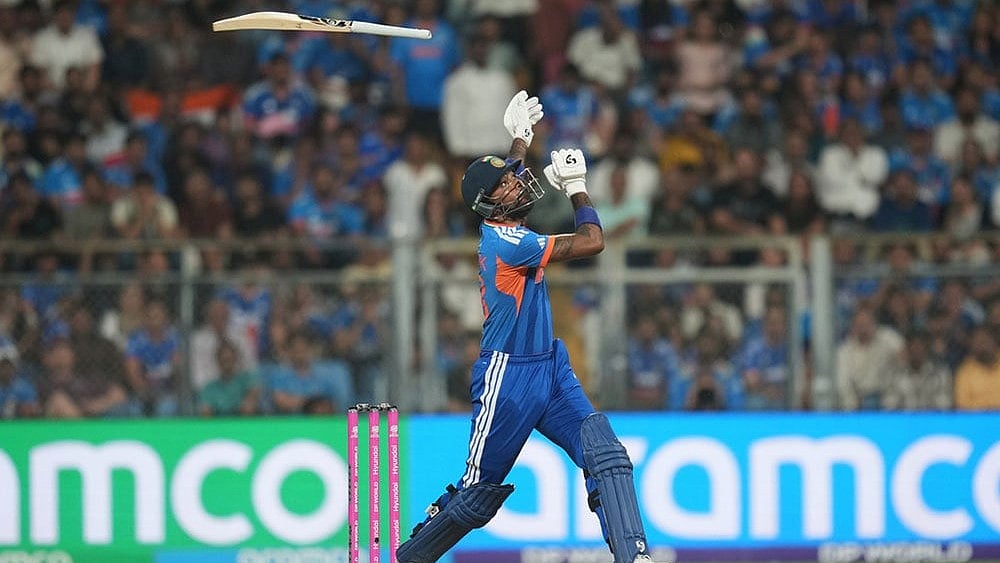 India's Hardik Pandya loses his grip on the bat during the T20 World Cup cricket semi-final match between India and England in Mumbai, India. - | Photo: AP/Rafiq Maqbool