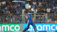 | Photo: AP/Rafiq Maqbool : India's Hardik Pandya loses his grip on the bat during the T20 World Cup cricket semi-final match between India and England in Mumbai, India.
