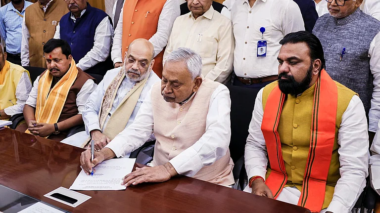 Patna: Bihar Chief Minister Nitish Kumar files his nomination for the Rajya Sabha polls in the presence of Union Home Minister Amit Shah and BJP National President Nitin Nabin, in Patna, Thursday, March 5, 2026. Bihar Deputy CM Samrat Choudhary is also seen. - | Source: PTI