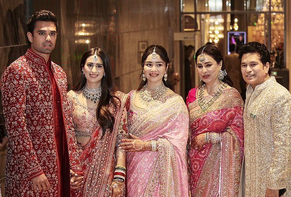 From right, Cricketer Sachin Tendulkar, with wife Anjali Tendulkar, daughter Sara Tendulkar during his son's Arjun Tendulkar and industrialist Ravi Ghai’s granddaughter Saaniya Chandhok wedding ceremony, in Mumbai. - | Photo: PTI