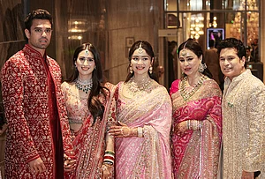| Photo: PTI : From right, Cricketer Sachin Tendulkar, with wife Anjali Tendulkar, daughter Sara Tendulkar during his son's Arjun Tendulkar and industrialist Ravi Ghai’s granddaughter Saaniya Chandhok wedding ceremony, in Mumbai.