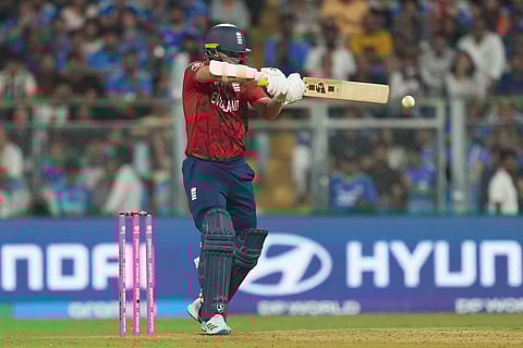 England's Sam Curran plays a shot during the T20 World Cup cricket semi-final match between India and England in Mumbai, India.