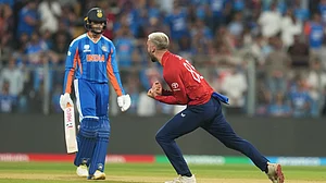 AP Photo/Rafiq Maqbool : England's Will Jacks, right, celebrates the dismissal of India's Abhishek Sharma, left, during the T20 World Cup cricket semi-final match between India and England in Mumbai, India, Thursday, March 5, 2026.