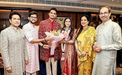 Shiv Sena (UBT) chief Uddhav Thackeray and party leader Aaditya Thackeray during the wedding ceremony of cricketer Sachin Tendulkar’s son Arjun Tendulkar and industrialist Ravi Ghai’s granddaughter Saaniya Chandhok, in Mumbai.