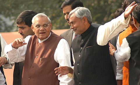 Former prime minister Atal Bihari Vajaypee with Bihar Chief Minister Nitish Kumar during an event, in Patna, in this Nov. 24, 2005, file image. 