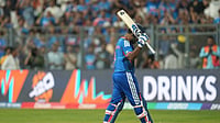 | Photo: AP/Rafiq Maqbool : India's Sanju Samson acknowledges the applause from the crowd as he walks off the field after losing his wicket during the T20 World Cup cricket semi-final match between India and England in Mumbai, India.
