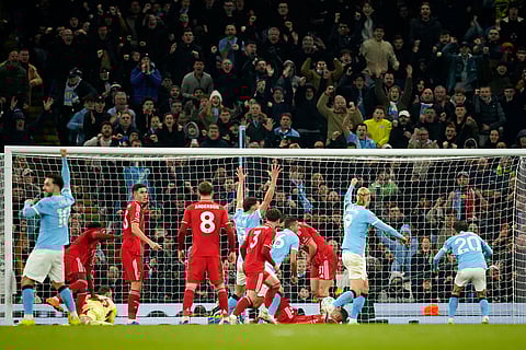 Manchester City players celebrate after Rodri scored his side's second goal during the English Premier League soccer match between Manchester City and Nottingham Forest in Manchester, England.