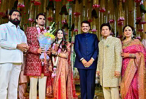 Maharashtra Chief Minister Devendra Fadnavis and state Deputy Chief Minister Eknath Shinde during the wedding ceremony of cricketer Sachin Tendulkar’s son Arjun Tendulkar and industrialist Ravi Ghai’s granddaughter Saaniya Chandhok, in Mumbai. 