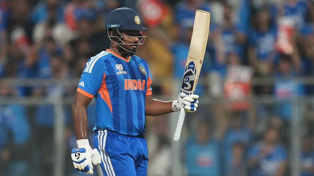 India's Sanju Samson celebrates after scoring fifty runs during the T20 World Cup cricket semi-final match between India and England in Mumbai, India, Thursday, March 5, 2026.  - AP Photo/Rafiq Maqbool