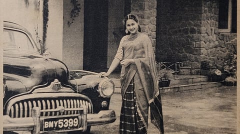 Nutan Beside A Buick