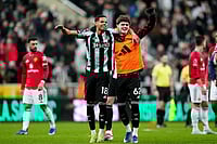 | Photo: Owen Humphreys/PA via AP : Newcastle United's William Osula, left, and Sean Neave celebrate after the English Premier League soccer match against Manchester United, in Newcastle, England.