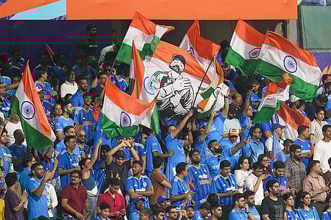 Fans cheer in the stands during the ICC Men's T20 World Cup 2026 second semifinal cricket match between India and England, at the Wankhede Stadium, in Mumbai, Maharashtra.