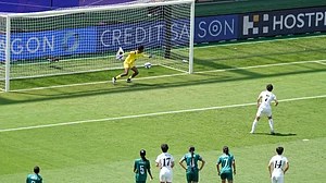 | Photo: AP/Rick Rycroft : North Korea's Myong Yu Jong, right, scores against Bangladesh's goalkeeper Mile Akter from a penalty during their Women's Asian Cup match in Sydney, Friday, March 6, 2026.