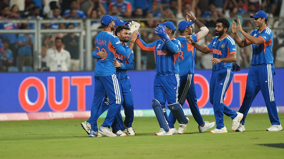 Indian players celebrate the dismissal of England's Will Jacks during the T20 World Cup cricket semi-final match between India and England. - AP